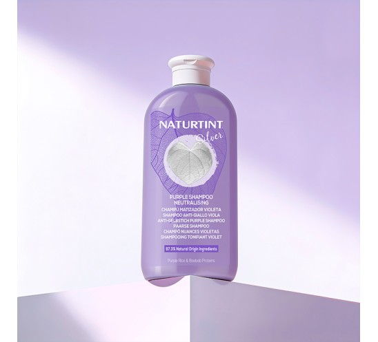 Champú matizador violeta sobre peana